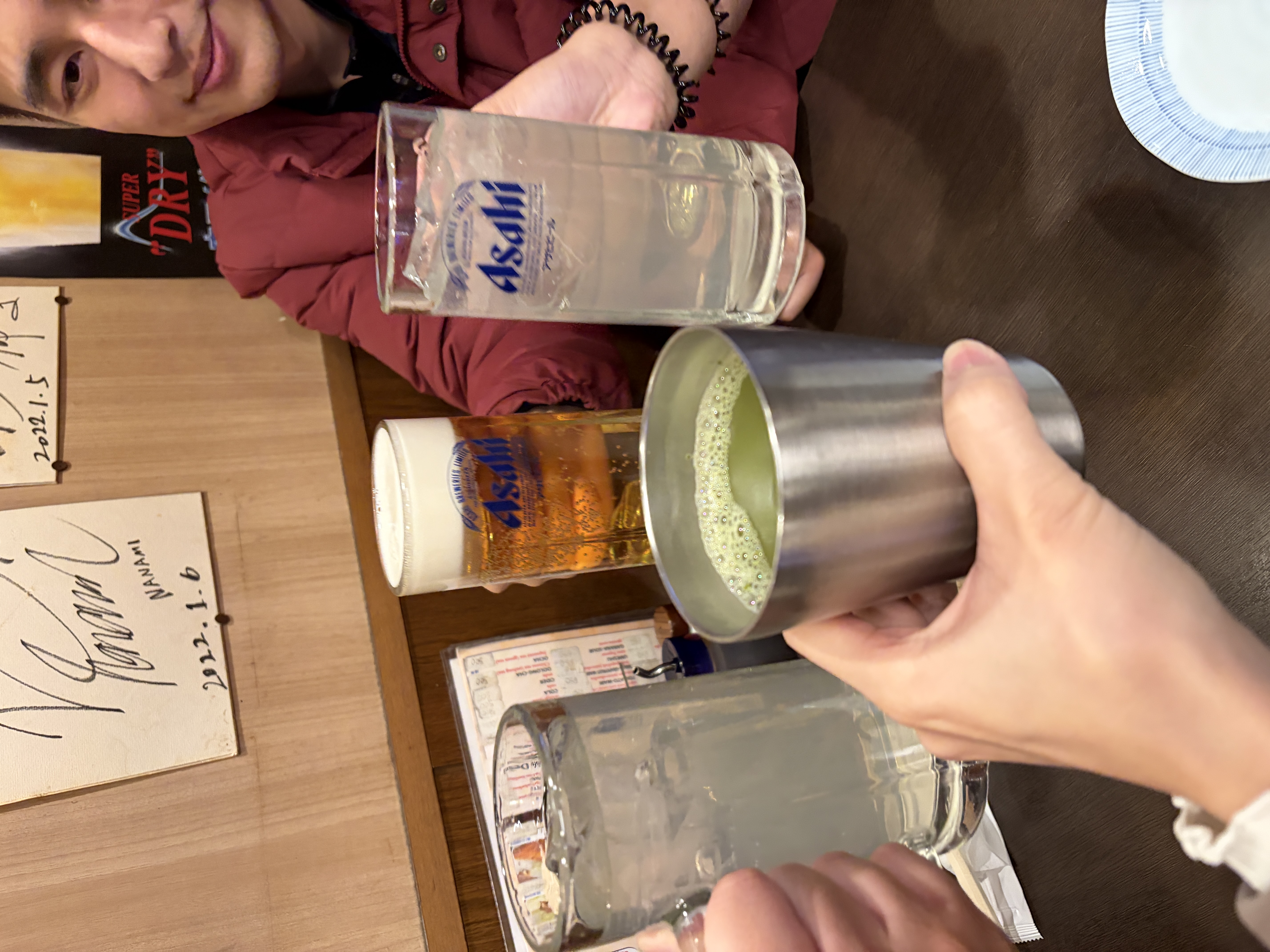 Cheers at a Tokyo izakaya