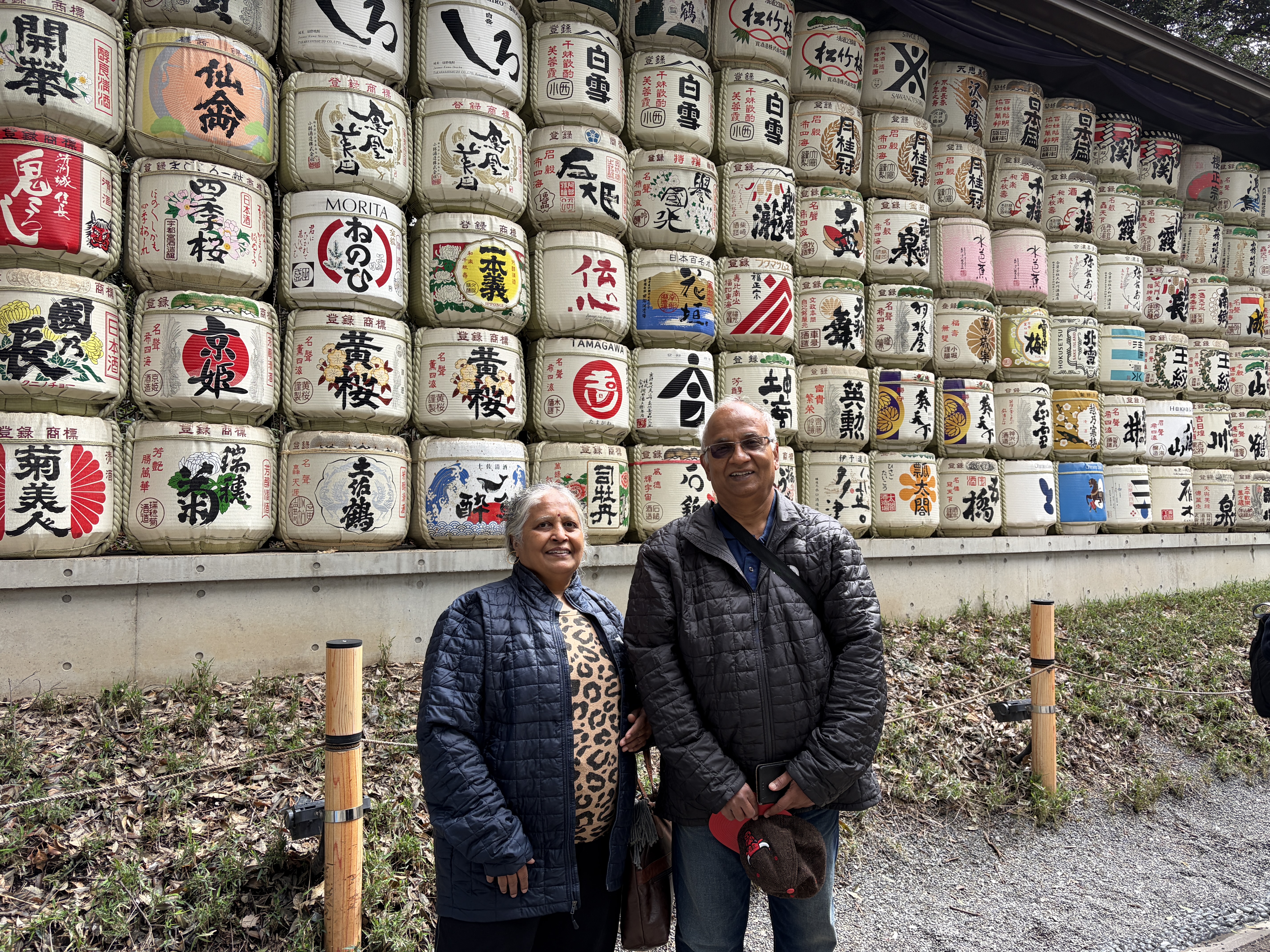 Couple at Meiji Shrine sake barrels